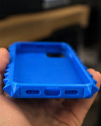 Close-up of the case's bottom charging-port opening and textured 3D-printed finish