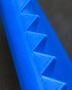 Close-up of raised triangular ridges and visible 3D-printed surface on the Prickly Phone Case