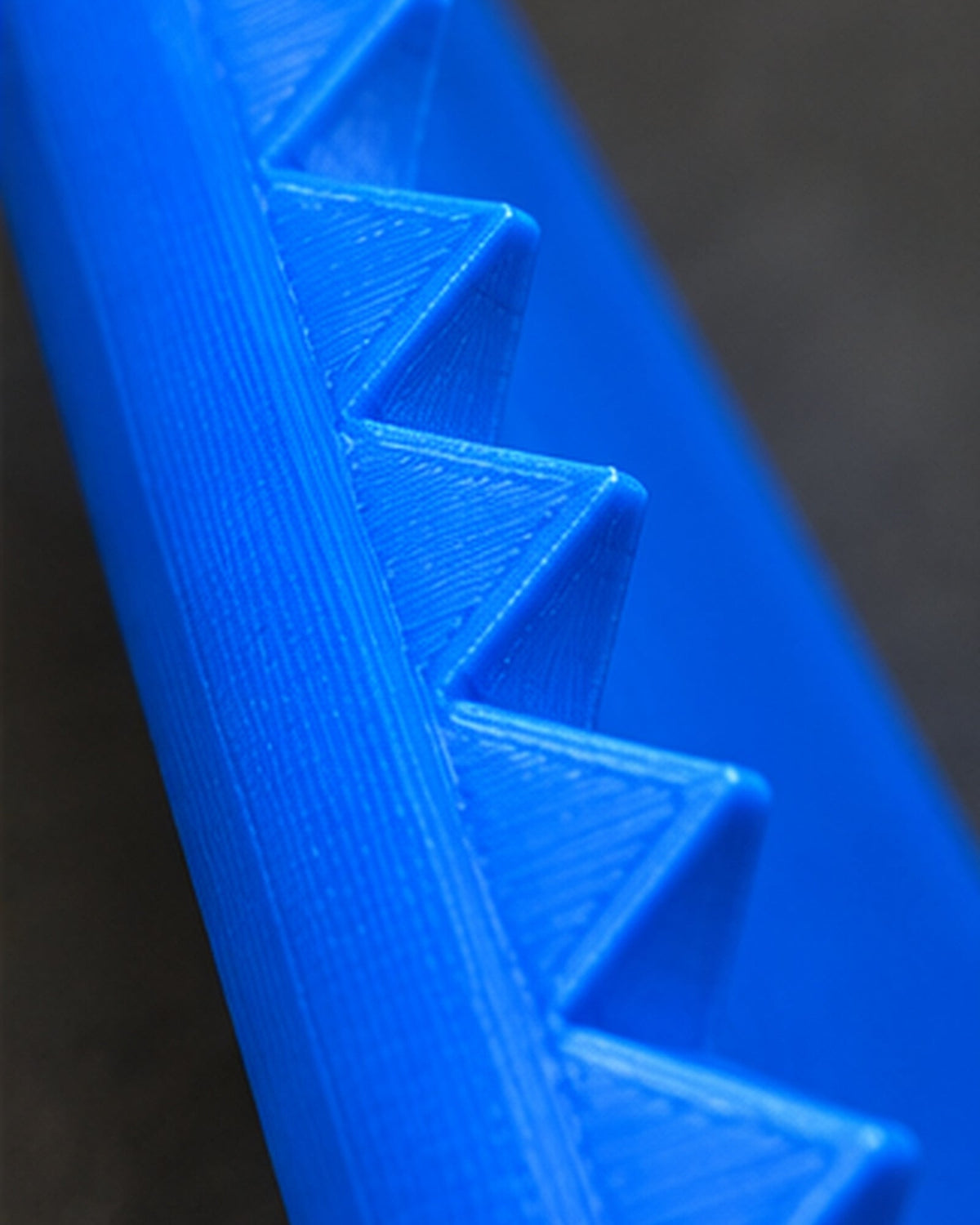 Close-up of raised triangular ridges and visible 3D-printed surface on the Prickly Phone Case